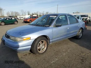 1996 Mercury Mystique z VIN 1MELM6532TK639432, wystawiony jako Copart lot #41884055 z przebiegiem 134 991 mil mil oraz Tytuł czysty. Historia ofert i sprzedaży dostępna na DreamBid. Obrazek 1.
