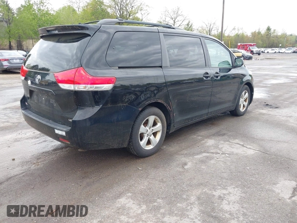 2014 Toyota Sienna LE AAS with VIN 5TDKK3DC0ES487830, listed as a IAAI auction lot 42216342 with 155,973 mi miles and . Bid and sale history available at carsss.com. Image 4.