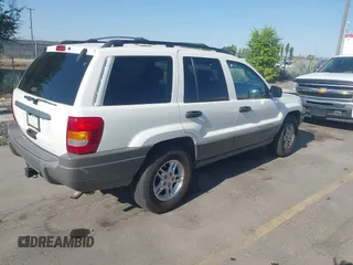 2002 Jeep Grand Cherokee Laredo with VIN 1J4GW48S22C131470, listed as a IAAI auction lot 42599375 with 200,815 mi miles and . Bid and sale history available at DreamBid. Image 4.