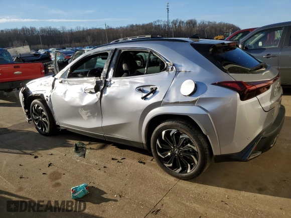 2023 Lexus UX 250h F Sport with VIN JTHB9JBHXP2067404, listed as a Copart auction lot 43605075 with 24,268 mi miles and Salvage title. Bid and sale history available at DreamBid. Image 2.