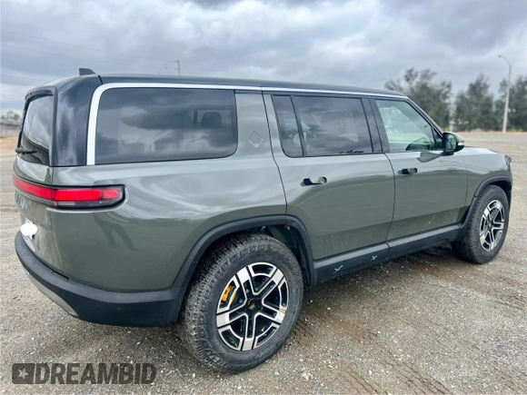 2023 Rivian R1S Launch Edition with VIN 7PDSGABL2PN003733, listed as a Copart auction lot 56033315 with 9,996 mi miles and Salvage Title. Bid and sale history available at carsss.com. Image 4.