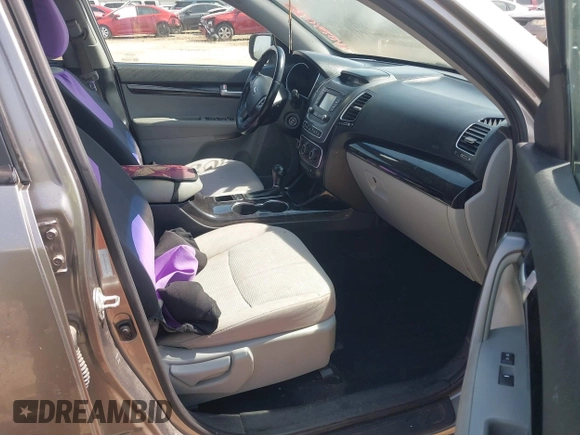 2014 Kia Sorento LX with VIN 5XYKT4A76EG462311, listed as a IAAI auction lot 41884030 with 139,030 mi miles and . Bid and sale history available at carsss.com. Image 5.