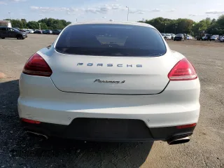 2014 Porsche Panamera с VIN WP0AA2A77EL008465, выставлен на аукционе Copart как лот 69671134 с пробегом Не указан миль и Чистый • Clean title. История ставок и продаж доступна на DreamBid. Изображение 6.