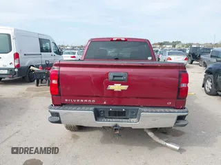 2015 Chevrolet Silverado 1500 LT with VIN 3GCUKREC0FG261927, listed as a IAAI auction lot 41598096 with Not Provided miles and . Bid and sale history available at DreamBid. Image 16.