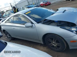 2002 Toyota Celica GT with VIN JTDDR32T120140349, listed as a IAAI auction lot 42037609 with 165,177 mi miles. Bid and sale history available at carsss.com. Image 13.