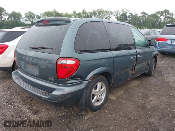 2005 Dodge Caravan SXT with VIN 1D4GP45R55B279825, listed as a IAAI auction lot 42532684 with 157,167 mi miles and . Bid and sale history available at DreamBid. Image 4.