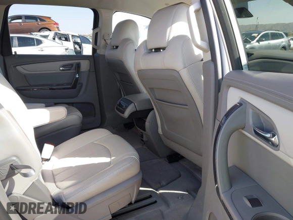 2014 Chevrolet Traverse LTZ with VIN 1GNKRJKD2EJ185682, listed as a IAAI auction lot 41728837 with 79,516 mi miles and . Bid and sale history available at DreamBid. Image 8.