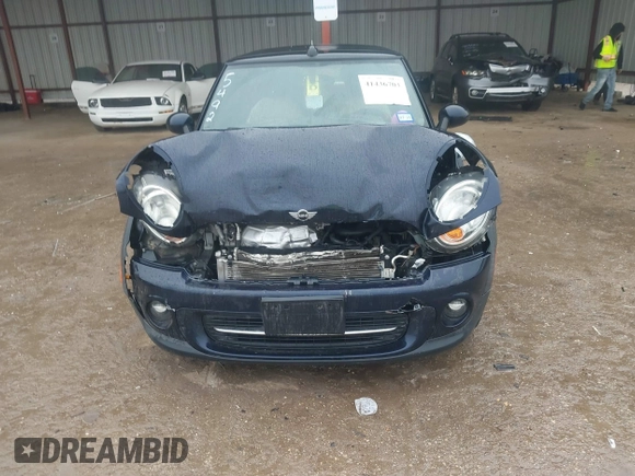 2013 MINI Convertible with VIN WMWZN3C53DT135492, listed as a IAAI auction lot 41436703 with 79,408 mi miles and . Bid and sale history available at DreamBid. Image 12.