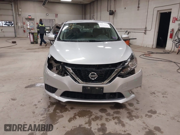 2019 Nissan Sentra S z VIN 3N1AB7AP7KY440764, wystawiony jako IAAI lot #41996693 z przebiegiem 34 594 mil mil oraz . Historia ofert i sprzedaży dostępna na DreamBid. Obrazek 13.