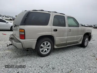 2005 GMC Yukon Denali z VIN 1GKEK63U25J187670, wystawiony jako Copart lot #51669995 z przebiegiem Nie podano mil oraz Nie do naprawy • Non repairable. Historia ofert i sprzedaży dostępna na DreamBid. Obrazek 3.