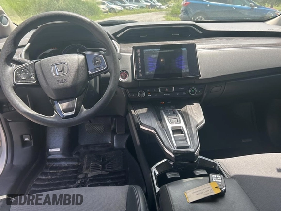 2019 Honda Clarity z VIN JHMZC5F14KC002619, wystawiony jako Copart lot #60905205 z przebiegiem 53 911 mil mil oraz Szkoda całkowita • Salvage title. Historia ofert i sprzedaży dostępna na DreamBid. Obrazek 9.