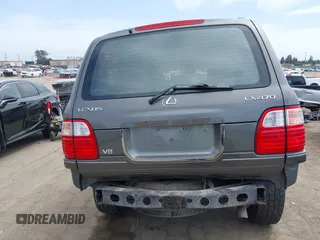 2001 Lexus LX 470 z VIN JTJHT00WX13509489, wystawiony jako IAAI lot #42227083 z przebiegiem 360 283 mil mil oraz . Historia ofert i sprzedaży dostępna na DreamBid. Obrazek 16.