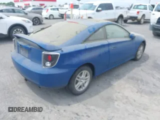 2001 Toyota Celica GT with VIN JTDDR32T810098020, listed as a IAAI auction lot 42133208 with 233,085 mi miles. Bid and sale history available at carsss.com. Image 4.