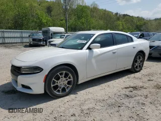 2015 Dodge Charger SXT with VIN 2C3CDXJG0FH903473, listed as a Copart auction lot 54045975 with 87,674 mi miles and Salvage title. Bid and sale history available at DreamBid. Image 1.