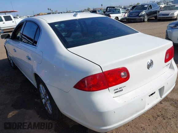 2009 Buick Lucerne CXL with VIN 1G4HD57M19U109257, listed as a IAAI auction lot 42064449 with 153,665 mi miles. Bid and sale history available at carsss.com. Image 3.