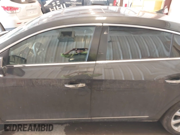 2014 Buick LaCrosse Premium I with VIN 1G4GD5G36EF305227, listed as a IAAI auction lot 41663704 with 142,230 mi miles and . Bid and sale history available at DreamBid. Image 14.