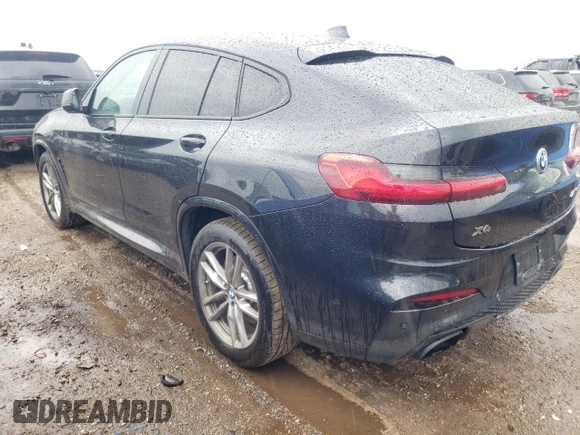 2021 BMW X4 M40i with VIN 5UX2V5C00M9H95699, listed as a Copart auction lot 63564433 with 33,500 mi miles and Salvage title. Bid and sale history available at DreamBid. Image 2.