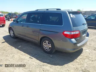2007 Honda Odyssey EX-L z VIN 5FNRL38797B137595, wystawiony jako IAAI lot #42002233 z przebiegiem 192 296 mil mil oraz . Historia ofert i sprzedaży dostępna na DreamBid. Obrazek 3.
