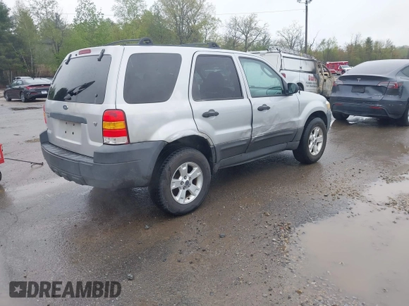 2005 Ford Escape XLT with VIN 1FMCU93115KC10947, listed as a IAAI auction lot 42215066 with 128,475 mi miles and . Bid and sale history available at DreamBid. Image 4.