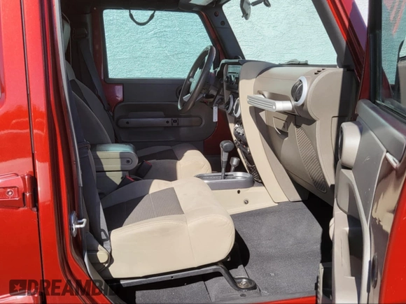 2010 Jeep Wrangler Unlimited Sahara with VIN 1J4BA5H10AL117474, listed as a IAAI auction lot 41969202 with 131,256 mi miles. Bid and sale history available at carsss.com. Image 5.