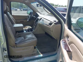 2009 Cadillac Escalade z VIN 1GYFK23249R284846, wystawiony jako IAAI lot #42184659 z przebiegiem Nie podano mil oraz . Historia ofert i sprzedaży dostępna na DreamBid. Obrazek 5.