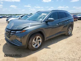 2022 Hyundai Tucson SEL z VIN KM8JB3AE7NU090396, wystawiony jako Copart lot #58737535 z przebiegiem 33 500 mil mil oraz Szkoda całkowita • Salvage title. Historia ofert i sprzedaży dostępna na DreamBid. Obrazek 1.