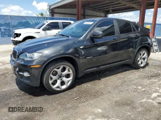 2012 BMW X6 35i z VIN 5UXFG2C55CL780491, wystawiony jako Copart lot #56526695 z przebiegiem 139 002 mil mil oraz Szkoda całkowita • Salvage title. Historia ofert i sprzedaży dostępna na DreamBid. Obrazek 1.