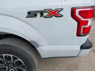2018 Ford F-150 XL with VIN 1FTEW1C52JKC49228, listed as a IAAI auction lot 42162616 with 148,329 mi miles. Bid and sale history available at carsss.com. Image 6.