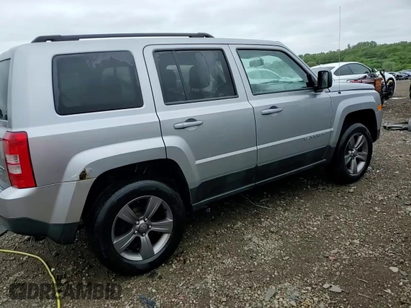 2015 Jeep Patriot High Altitude with VIN 1C4NJRFB2FD396806, listed as a Copart auction lot 57651155 with 130,357 mi miles and Salvage title. Bid and sale history available at DreamBid. Image 14.