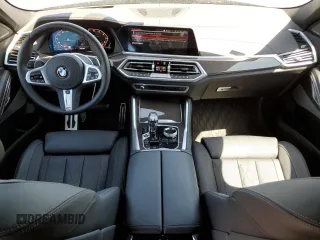 2023 BMW X6 M50i with VIN 5UXCY8C09P9P28422, listed as a Copart auction lot 52818133 with 4,131 mi miles and Salvage Title. Bid and sale history available at carsss.com. Image 8.