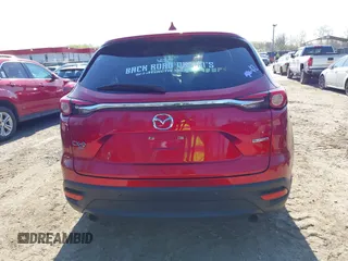 2020 Mazda CX-9 Touring z VIN JM3TCBCY6L0401324, wystawiony jako IAAI lot #41973626 z przebiegiem 53 891 mil mil oraz . Historia ofert i sprzedaży dostępna na DreamBid. Obrazek 17.