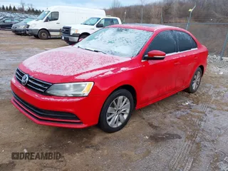 2015 Volkswagen Jetta Sedan 1.8T SE w/Connectivity with VIN 3VWD07AJ9FM347685, listed as a IAAI auction lot 41268666 with 140,861 mi miles. Bid and sale history available at carsss.com. Image 2.