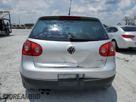 2009 Volkswagen Rabbit S с VIN WVWBA71KX9W048212, выставлен на аукционе Copart как лот 60592825 с пробегом 141 893 миль миль и Списание • Salvage title. История ставок и продаж доступна на DreamBid. Изображение 6.