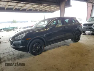 2012 Porsche Cayenne S Hybrid z VIN WP1AE2A28CLA93269, wystawiony jako Copart lot #45205745 z przebiegiem 72 949 mil mil oraz Szkody całkowita. Historia ofert i sprzedaży dostępna na DreamBid. Obrazek 1.