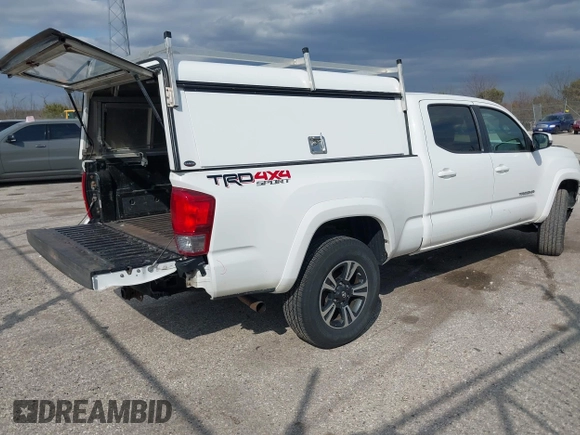 2017 Toyota Tacoma SR5 with VIN 3TMDZ5BN4HM018877, listed as a IAAI auction lot 41898666 with 198,848 mi miles. Bid and sale history available at carsss.com. Image 4.