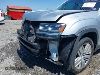 2019 Volkswagen Atlas SE with VIN 1V2UR2CA7KC528108, listed as a IAAI auction lot 42045402 with 66,479 mi miles and . Bid and sale history available at DreamBid. Image 6.