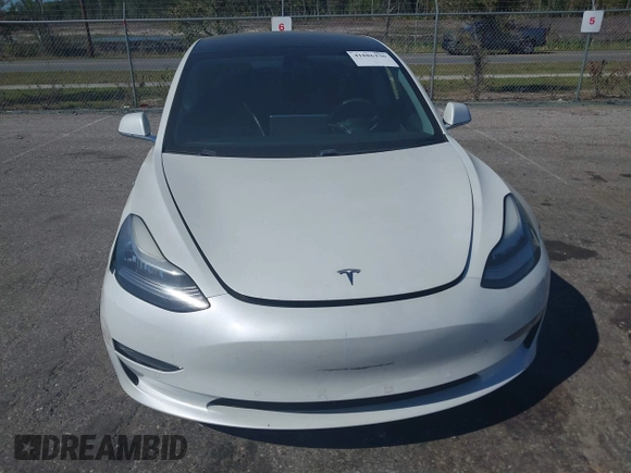 2019 Tesla Model 3 Mid Range with VIN 5YJ3E1EA7KF425127, listed as a IAAI auction lot 41886436 with 87,236 mi miles and . Bid and sale history available at carsss.com. Image 12.