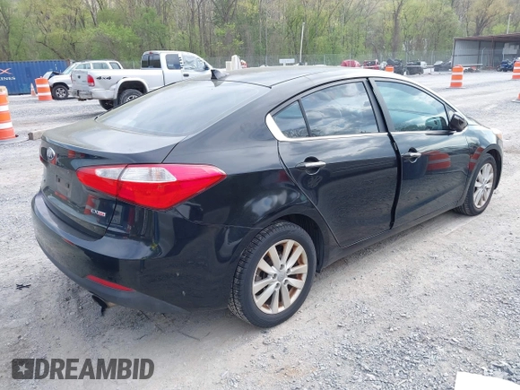 2014 Kia Forte EX with VIN KNAFX4A86E5049938, listed as a IAAI auction lot 42038755 with 82,016 mi miles. Bid and sale history available at carsss.com. Image 4.