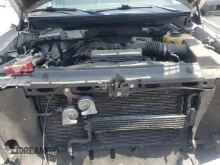 2011 Ford F-150 XL with VIN 1FTEX1EM0BFC72857, listed as a Copart auction lot 61140985 with 180,073 mi miles and Salvage title. Bid and sale history available at DreamBid. Image 11.