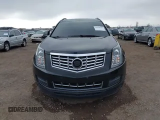 2015 Cadillac SRX with VIN 3GYFNAE37FS598023, listed as a IAAI auction lot 41198546 with 127,373 mi miles and . Bid and sale history available at carsss.com. Image 12.