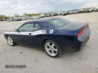 2013 Dodge Challenger R/T z VIN 2C3CDYBT9DH585965, wystawiony jako Copart lot #52995875 z przebiegiem 131 456 mil mil oraz Szkoda całkowita • Salvage title. Historia ofert i sprzedaży dostępna na DreamBid. Obrazek 2.