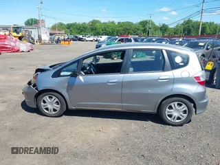 2009 Honda Fit with VIN JHMGE882X9S000639, listed as a IAAI auction lot 42308524 with 211,128 mi miles and . Bid and sale history available at DreamBid. Image 14.