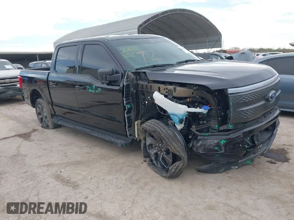 2023 Ford F-150 Lightning Pro z VIN 1FTVW1ELXPWG55836, wystawiony jako IAAI lot #41328873 z przebiegiem 6 742 mil mil oraz . Historia ofert i sprzedaży dostępna na DreamBid. Obrazek 1.