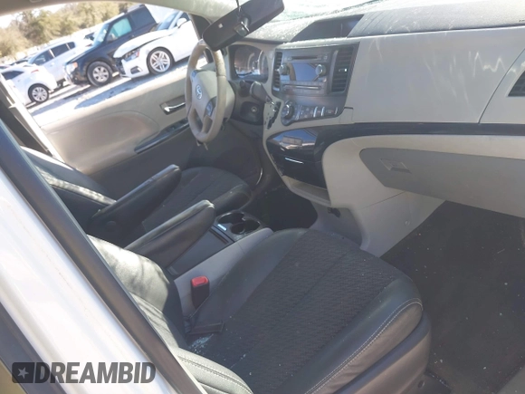 2014 Toyota Sienna SE with VIN 5TDXK3DC4ES487772, listed as a IAAI auction lot 41218295 with 153,368 mi miles and . Bid and sale history available at DreamBid. Image 5.