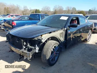 2019 Dodge Charger SXT with VIN 2C3CDXJG4KH710673, listed as a IAAI auction lot 41469797 with 102,011 mi miles and . Bid and sale history available at DreamBid. Image 18.