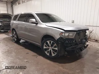 2014 Dodge Durango R/T z VIN 1C4SDJCTXEC558937, wystawiony jako IAAI lot #41570244 z przebiegiem 174 724 mil mil oraz . Historia ofert i sprzedaży dostępna na DreamBid. Obrazek 1.