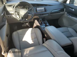 2023 Cadillac XT4 FWD Premium Luxury z VIN 1GYFZCR44PF175022, wystawiony jako Copart lot #49214855 z przebiegiem 50 234 mil mil oraz Nie do naprawy • Non repairable. Historia ofert i sprzedaży dostępna na DreamBid. Obrazek 8.