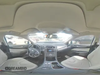 2017 Ford Fusion Hybrid Titanium with VIN 3FA6P0RU1HR138725, listed as a Copart auction lot 56650625 with 77,331 mi miles and Salvage title. Bid and sale history available at DreamBid. Image 14.