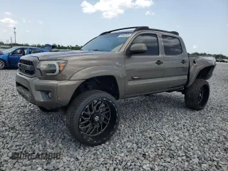 2012 Toyota Tacoma PreRunner with VIN 5TFJX4GN2CX008055, listed as a Copart auction lot 59943885 with 220,904 mi miles and Salvage title. Bid and sale history available at DreamBid. Image 1.