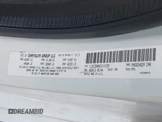 2014 Chrysler 200 LX with VIN 1C3CCBAB4EN141555, listed as a IAAI auction lot 41903899 with 242,673 mi miles. Bid and sale history available at carsss.com. Image 9.